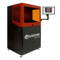 EnvisionTEC Vector 3SP 3D Printer with a black and orange chassis and a computer monitor on the side of the system.