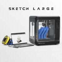 MakerBot Sketch Large 3D printer with laptop, filament, and accessories.
